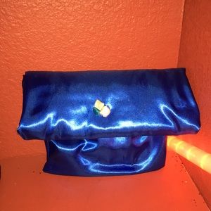 Sapphire silk makeup clutch by Doodlez